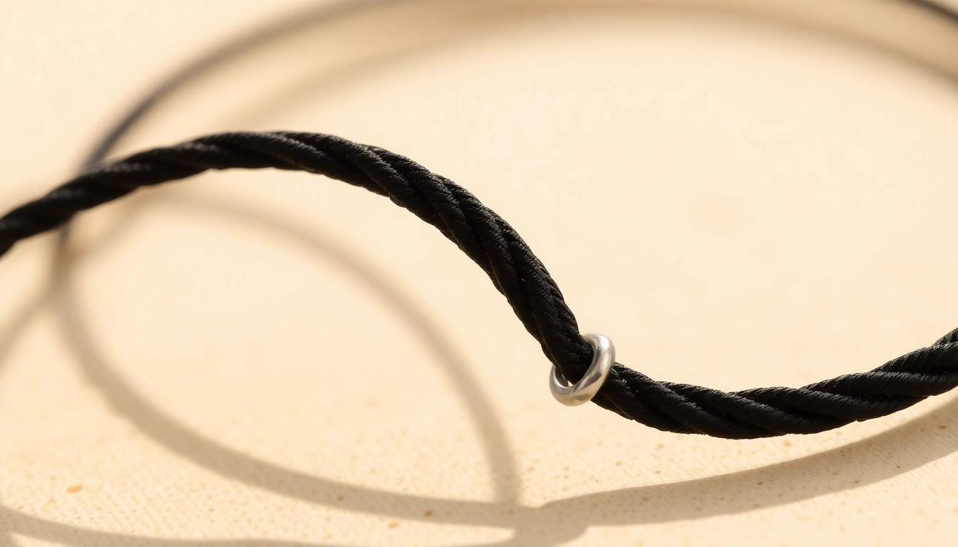 Sleek silver bracelet on a black cord showcasing the charm of srebrna bransoletka na sznurku